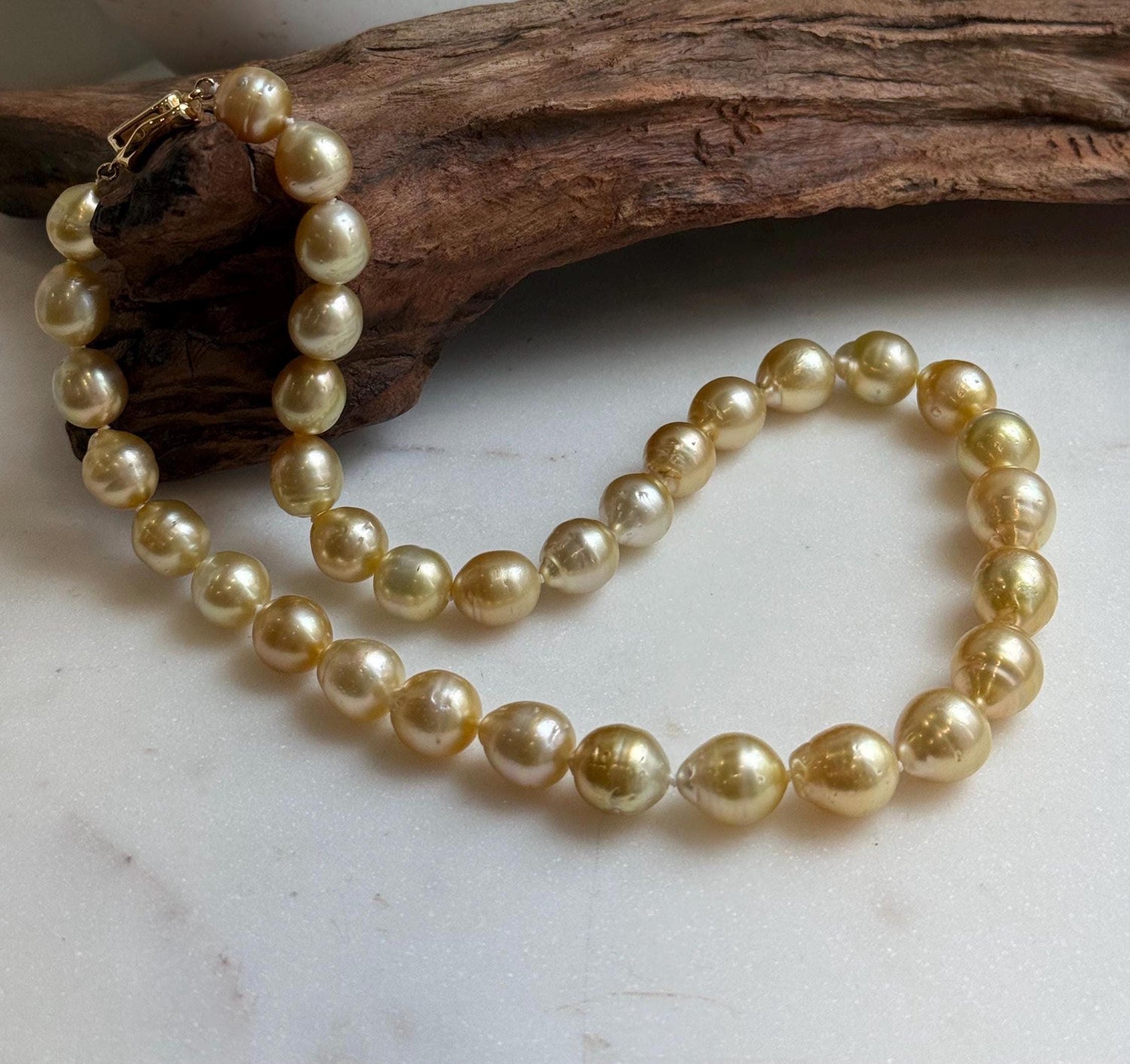 Elly’s 10-12.6mm 34pcs Genius natural South sea Golden Ocean Pearls Necklace: Extreme luster, 18.4” knotted, S925 silver necklace strand.