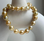Elly’s 10-12.6mm 34pcs Genius natural South sea Golden Ocean Pearls Necklace: Extreme luster, 18.4” knotted, S925 silver necklace strand.