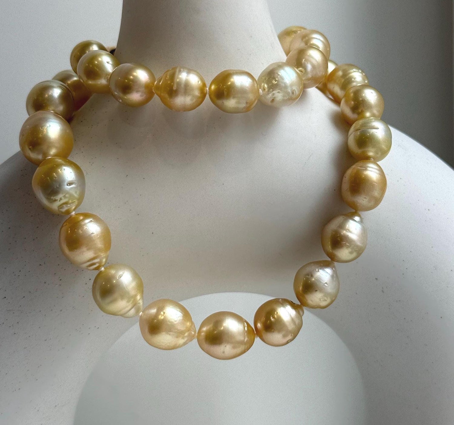 Elly’s 10-12.6mm 34pcs Genius natural South sea Golden Ocean Pearls Necklace: Extreme luster, 18.4” knotted, S925 silver necklace strand.