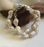 Elly’s 19pcs White Iridescent Baroque Tail pearls necklace strand: Extreme luster mirrored, To 25.2mm. Knotted, 18.5”, S925 silver necklace. high quality baroque pearls necklace for her