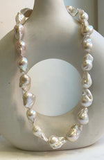 Elly’s 19pcs White Iridescent Baroque Tail pearls necklace strand: Extreme luster mirrored, To 25.2mm. Knotted, 18.5”, S925 silver necklace. high quality baroque pearls necklace for her