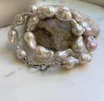 Elly’s 19pcs White Iridescent Baroque Tail pearls necklace strand: Extreme luster mirrored, To 25.2mm. Knotted, 18.5”, S925 silver necklace. high quality baroque pearls necklace for her