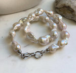Elly’s 19pcs White Iridescent Baroque Tail pearls necklace strand: Extreme luster mirrored, To 25.2mm. Knotted, 18.5”, S925 silver necklace. high quality baroque pearls necklace for her