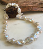 Elly’s 17pcs White Iridescent Baroque Tail pearls necklace strand: Extreme luster mirrored, To 32mm. Knotted, 18.1”, S925 silver necklace. high quality baroque pearls necklace strand gift for her birthday anniversary statement retirement
