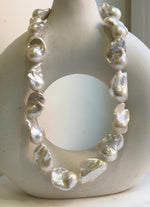 Elly’s 17pcs White Iridescent Baroque Tail pearls necklace strand: Extreme luster mirrored, To 32mm. Knotted, 18.1”, S925 silver necklace. high quality baroque pearls necklace strand gift for her birthday anniversary statement retirement