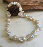Elly’s 17pcs White Iridescent Baroque Tail pearls necklace strand: Extreme luster mirrored, To 32mm. Knotted, 18.1”, S925 silver necklace. high quality baroque pearls necklace strand gift for her birthday anniversary statement retirement