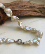 Elly’s 17pcs White Iridescent Baroque Tail pearls necklace strand: Extreme luster mirrored, To 32mm. Knotted, 18.1”, S925 silver necklace. high quality baroque pearls necklace strand gift for her birthday anniversary statement retirement