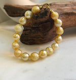 Elly’s 9.7-11mm 16pcs Genius South sea golden Ocean Pearls bracelet: Extreme luster, gold to deep golden pearls, 8.6”, S925 silver bracelet. high quality genius golden ocean pearls gift for her birthday anniversary statement holiday retirement