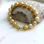 Elly’s 9.7-11mm 16pcs Genius South sea golden Ocean Pearls bracelet: Extreme luster, gold to deep golden pearls, 8.6”, S925 silver bracelet. high quality genius golden ocean pearls gift for her birthday anniversary statement holiday retirement