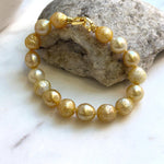 Elly’s 9.7-11mm 16pcs Genius South sea golden Ocean Pearls bracelet: Extreme luster, gold to deep golden pearls, 8.6”, S925 silver bracelet. high quality genius golden ocean pearls gift for her birthday anniversary statement holiday retirement