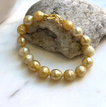 Elly’s 9.7-11mm 16pcs Genius South sea golden Ocean Pearls bracelet: Extreme luster, gold to deep golden pearls, 8.6”, S925 silver bracelet. high quality genius golden ocean pearls gift for her birthday anniversary statement holiday retirement
