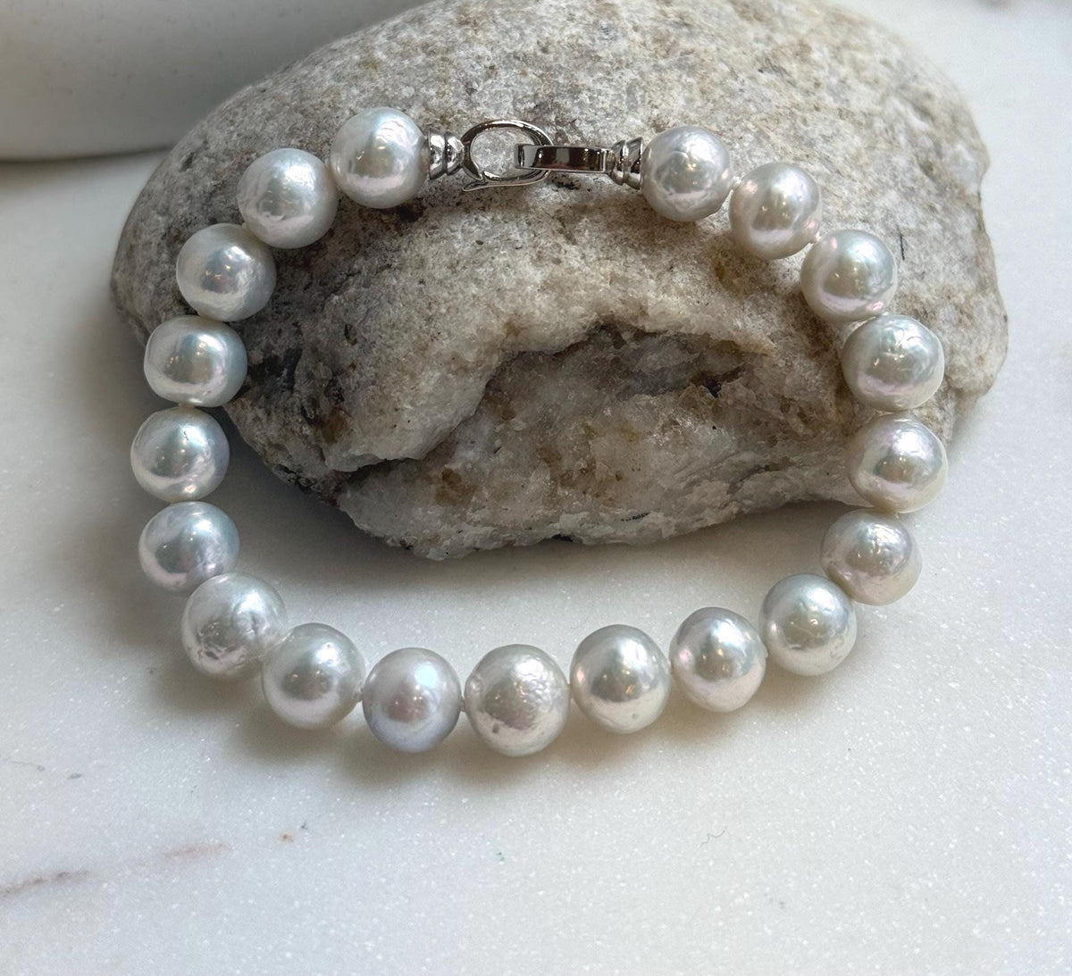 Elly’s 9.1-9.9mm Natural Ivory Pop Crinkle Pearls Bracelet: Extreme luster mirrored, knotted, S925 silver Bracelet.