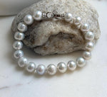 Elly’s 9.1-9.9mm Natural Ivory Pop Crinkle Pearls Bracelet: Extreme luster mirrored, knotted, S925 silver Bracelet.