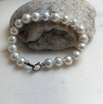 Elly’s 9.1-9.9mm Natural Ivory Pop Crinkle Pearls Bracelet: Extreme luster mirrored, knotted, S925 silver Bracelet. gift for her birthday