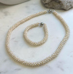 Elly’s Ivory rice Keshi Pearls Caterpillar Necklace Strand Bracelet Set: 2-3mm, thousand pearls, S925 silver magnetic clips. gift for her