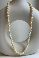 Elly’s 57pcs Akoya Golden ocean pearls necklace:Extreme luster mirrored, knotted 18”, S925 silver necklace strand. high quality golden ocean pearls necklace strand for her daily office wear