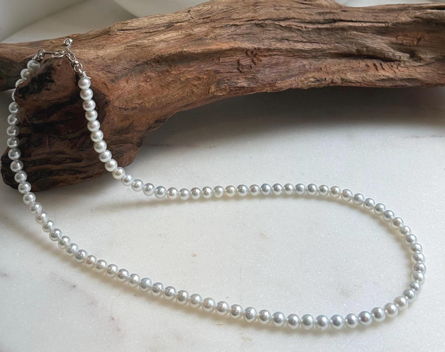 Elly’s 4.7-5.3mm Insale Freshwater White Pearls Necklace: Extreme luster mirrored, To 18.9”, S925 silver necklace strand.