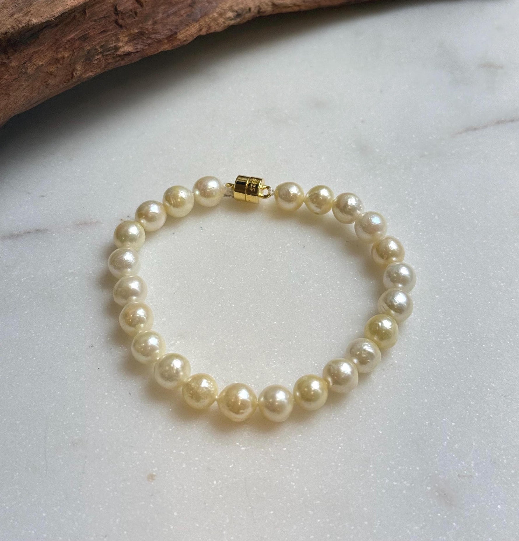 Elly’s 6.9-7.5mm Genius Akoya light golden ocean Pearls Bracelet: Extreme luster mirrored, S925 silver Bracelet. different sizes.