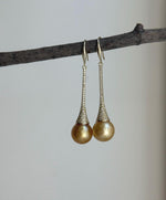 Elly’s 11mm Genius South sea deep golden ocean Pearls Earrings hooks: Extreme luster mirrored, 5.1cm high, S925 silver earrings.