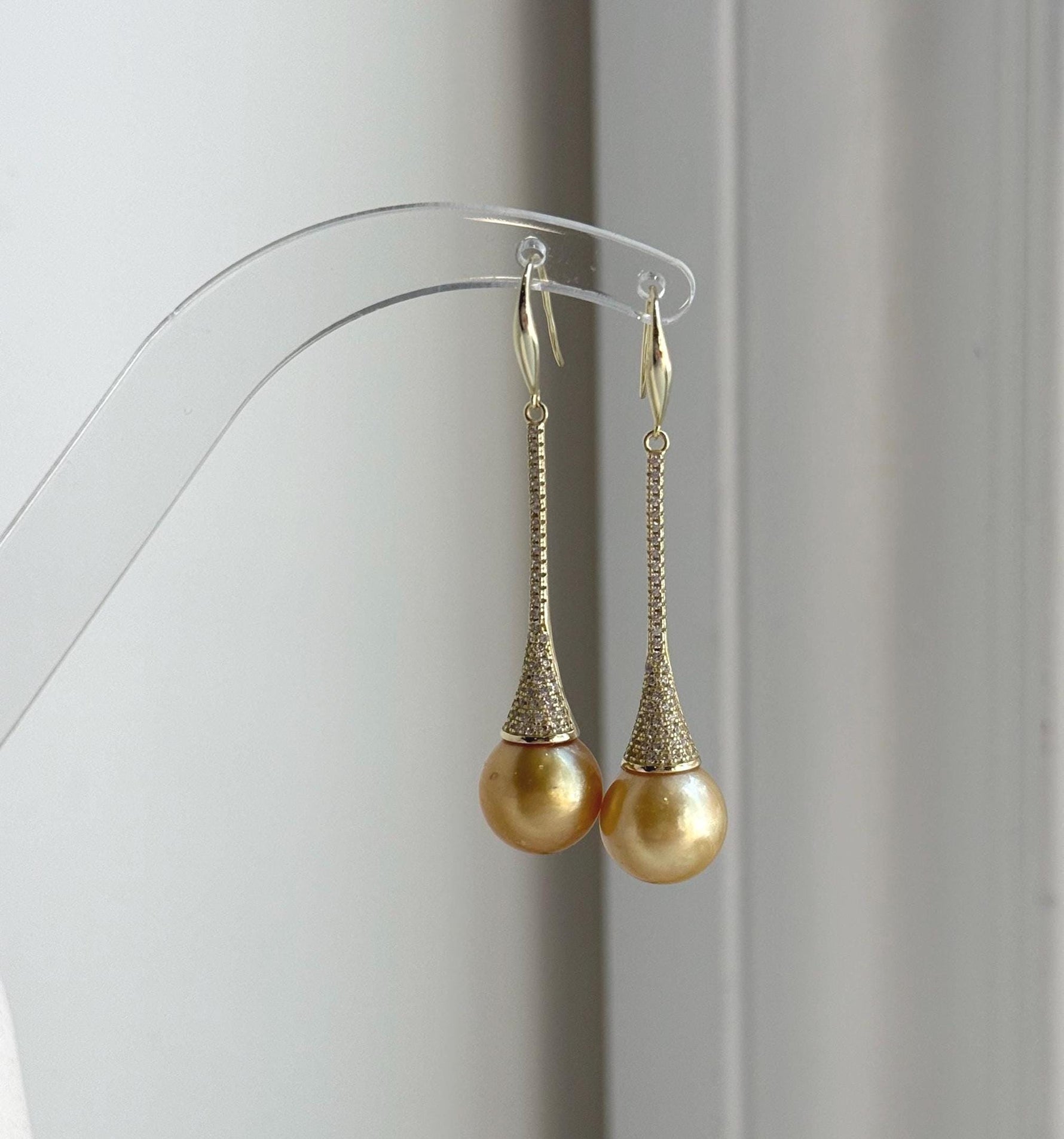 Elly’s 11mm Genius South sea deep golden ocean Pearls Earrings hooks: Extreme luster mirrored, 5.1cm high, S925 silver earrings.