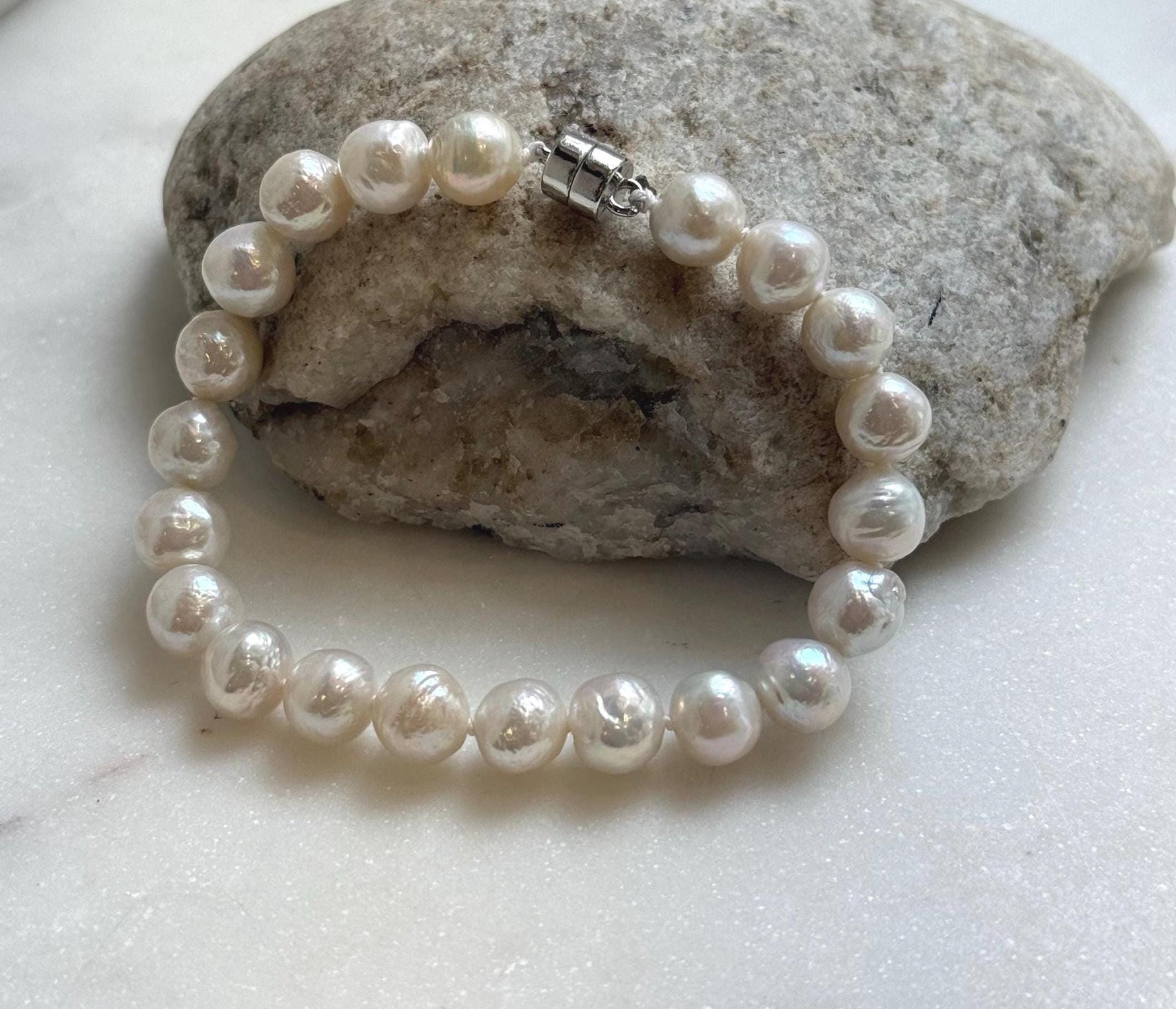 Elly’s 7.9-8.4mm Natural White Pop Crinkle Pearls Bracelet: Extreme luster mirrored, knotted, S925 silver Bracelet. high quality white pearls bracely for her party