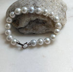 Elly’s 9.1-9.9mm Natural Ivory Pop Crinkle Pearls Bracelet: Extreme luster mirrored, knotted, S925 silver Bracelet. gift for her birthday