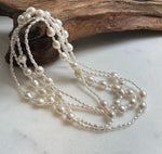 Elly’s 2.5-7.5mm Freshwater white iridescent Keshi pearls Long necklace:Extreme luster mirrored.