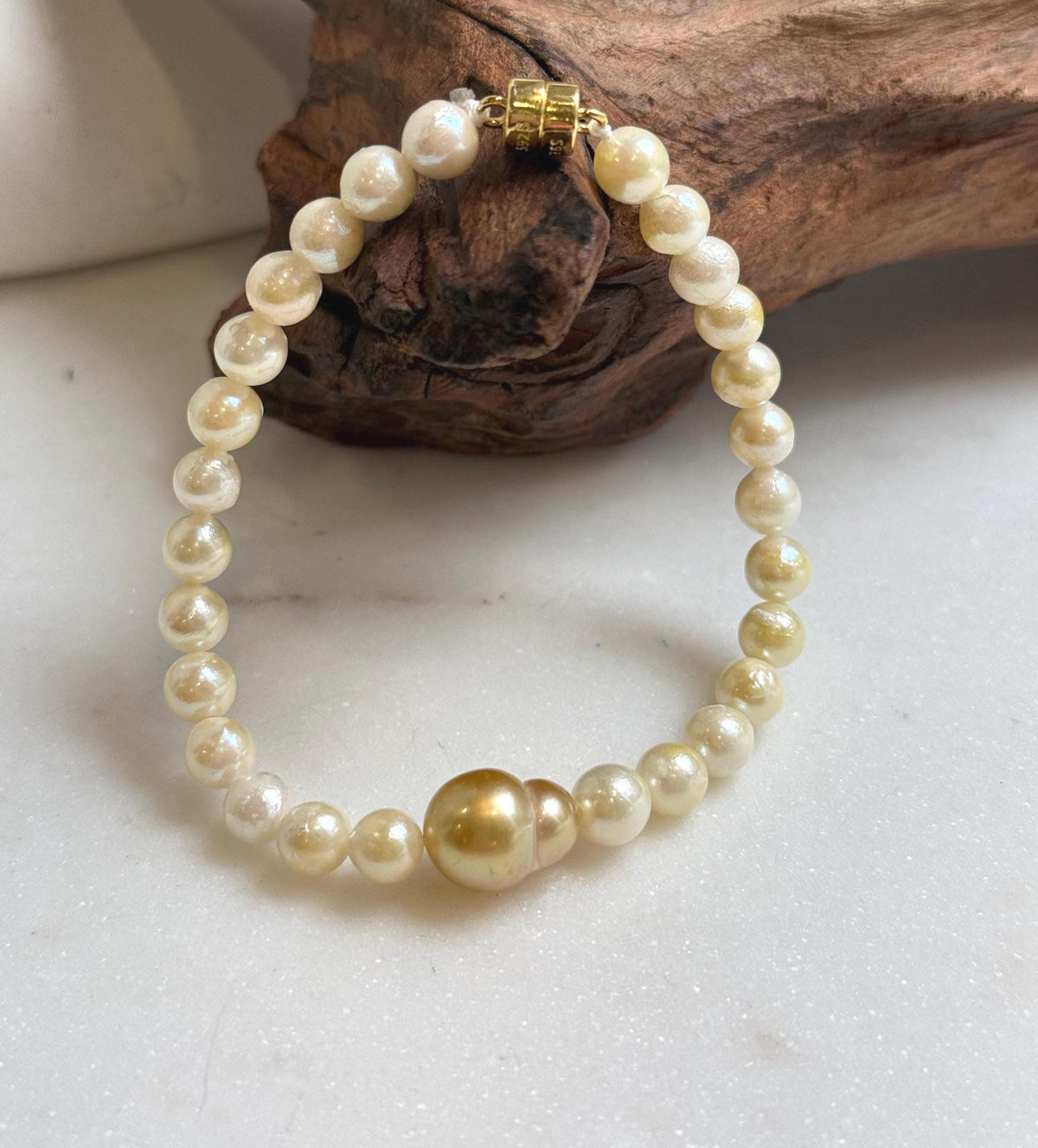 Elly’s 10.7mm South sea deep golden Akoya ocean Pearls Bracelet: Extreme luster mirrored, S925 silver Bracelet. Different size.