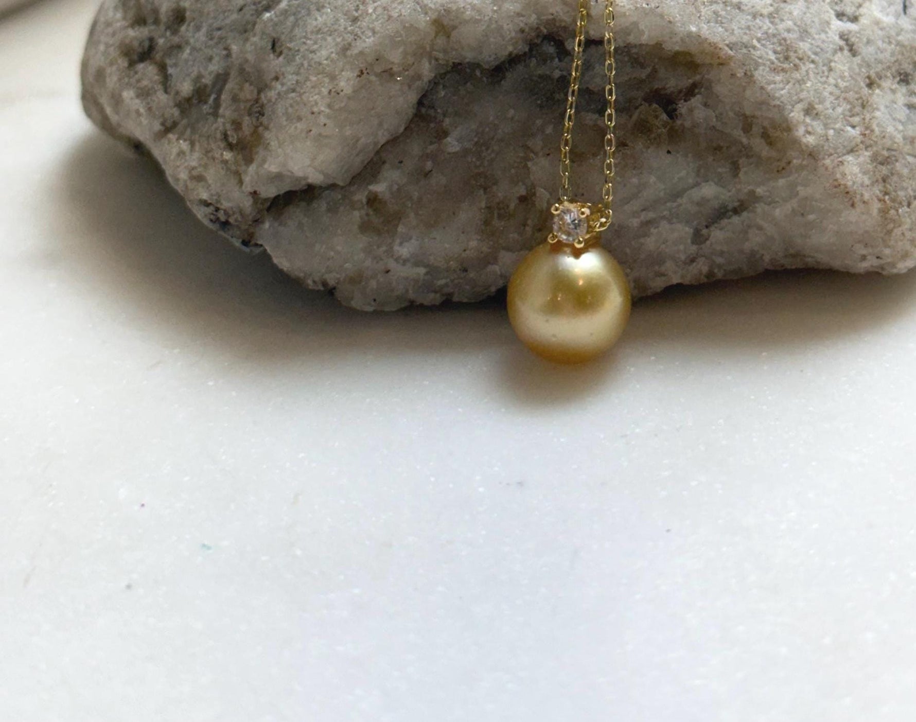 Elly’s 10.4mm Genius South sea deep gold ocean pearl Pendant: Extreme luster, 1.4cm high, s925 silver 18k gold plated pendant.