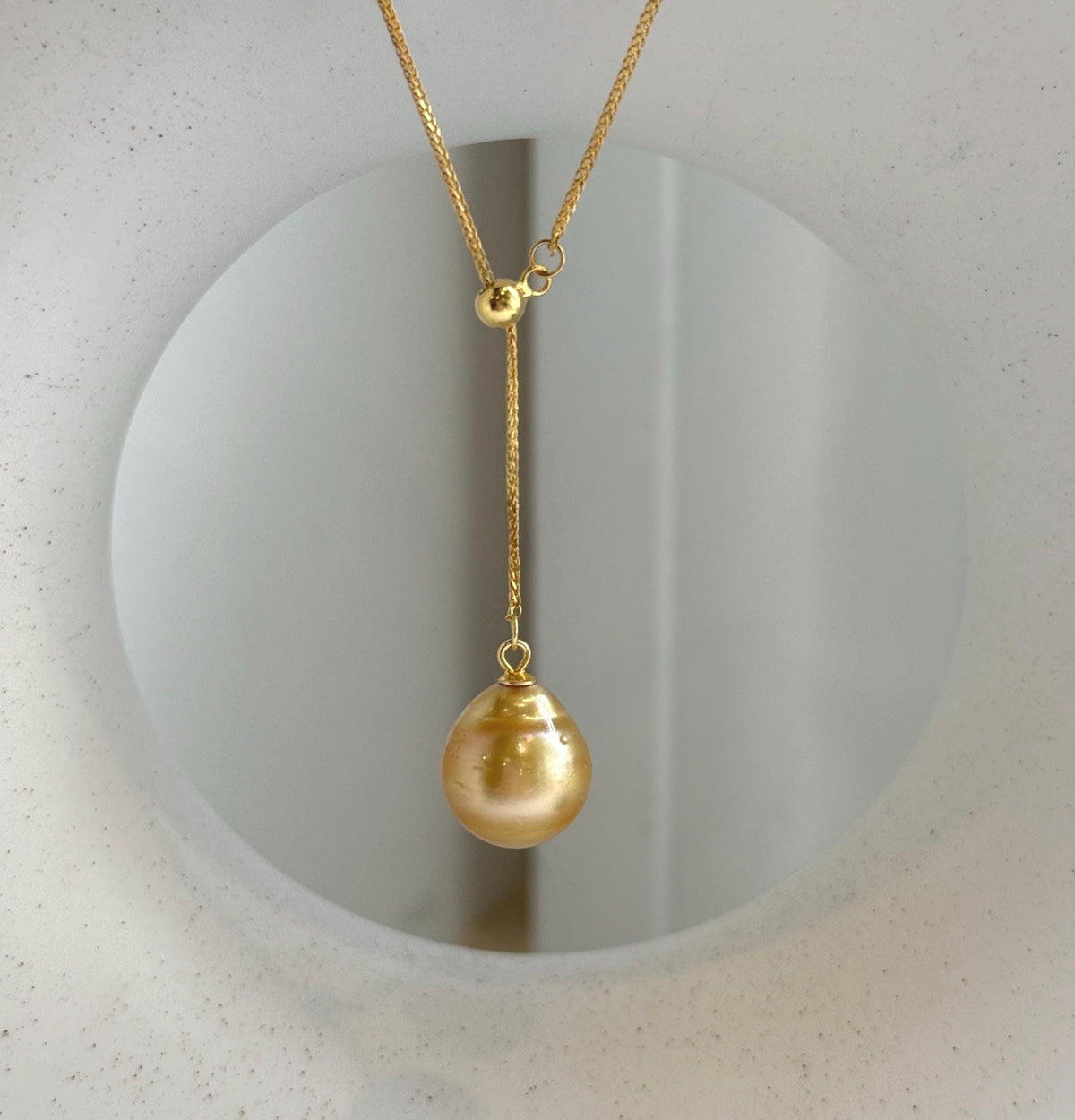 Elly’s 12.2mm Genius South sea deep tea golden ocean pearl Pendant: Extreme luster mirrored, to 17.3”, s925 silver Y-Lariat chain set.