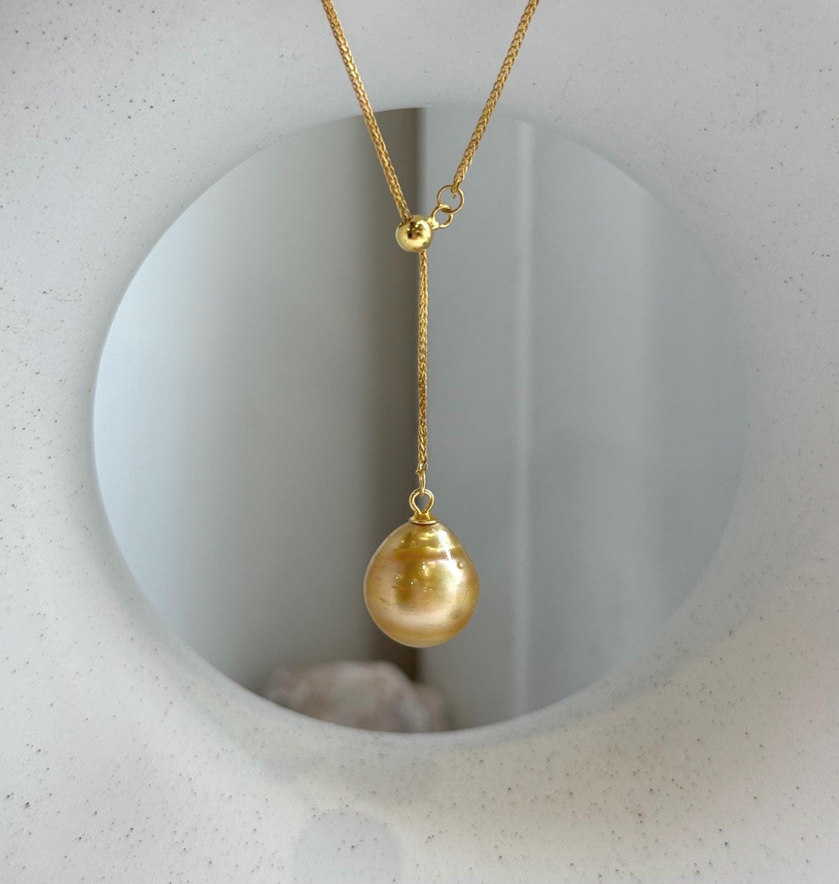 Elly’s 12.2mm Genius South sea deep tea golden ocean pearl Pendant: Extreme luster mirrored, to 17.3”, s925 silver Y-Lariat chain set.