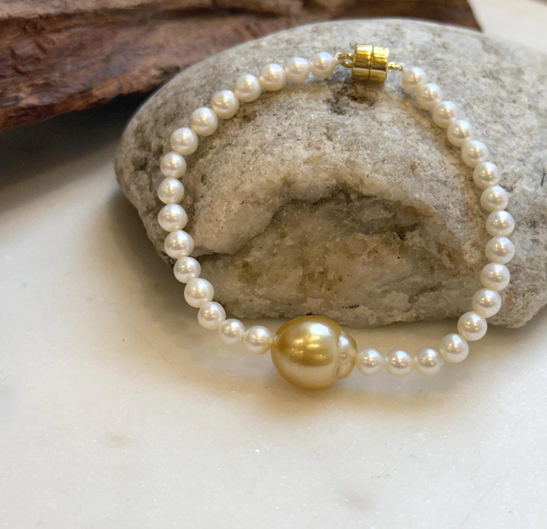 Elly’s 11.7mm South sea deep golden Freshwater Pearls Bracelet: Extreme luster mirrored, S925 silver Bracelet. Different size.