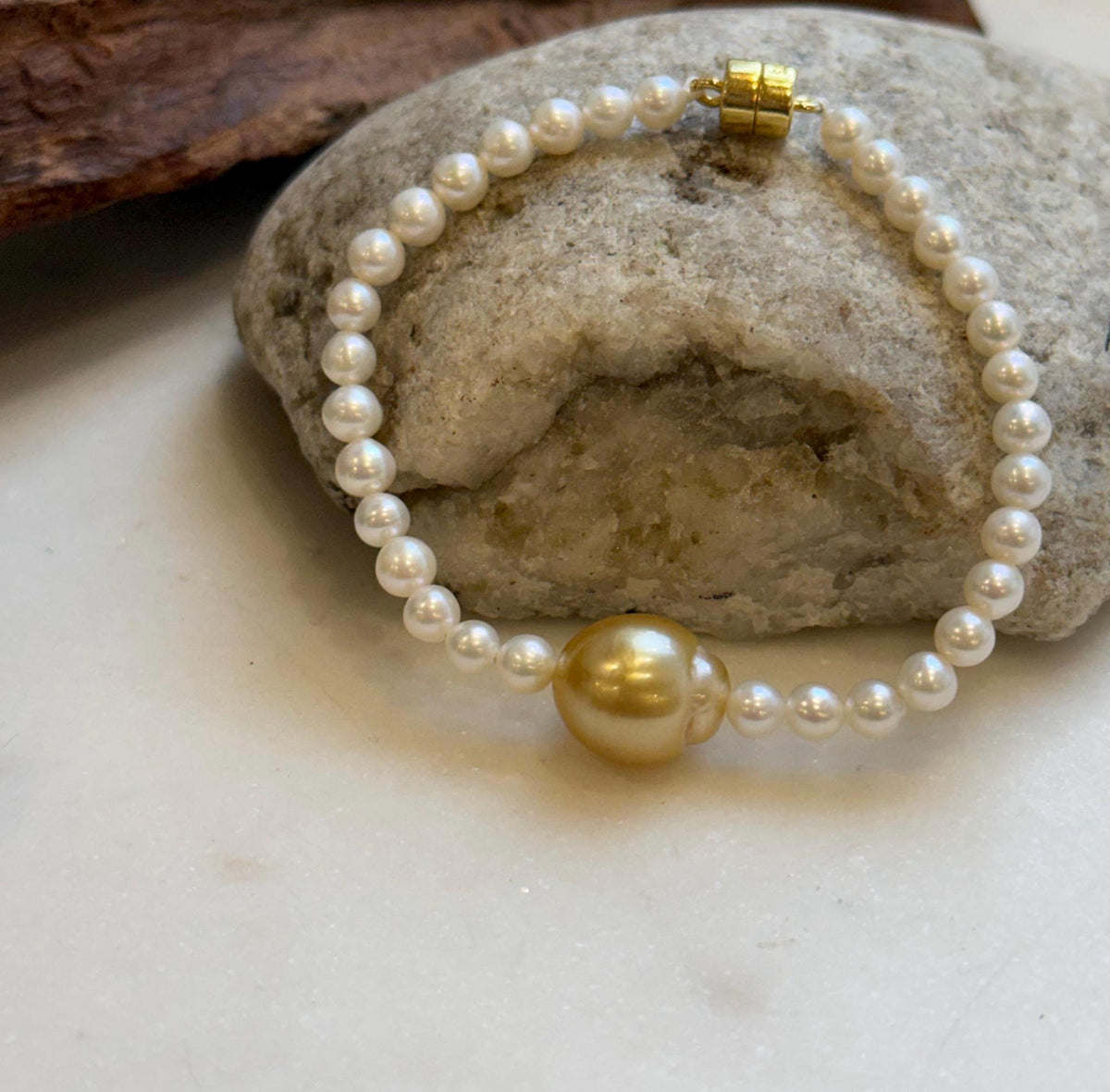 Elly’s 11.7mm South sea deep golden Freshwater Pearls Bracelet: Extreme luster mirrored, S925 silver Bracelet. Different size.