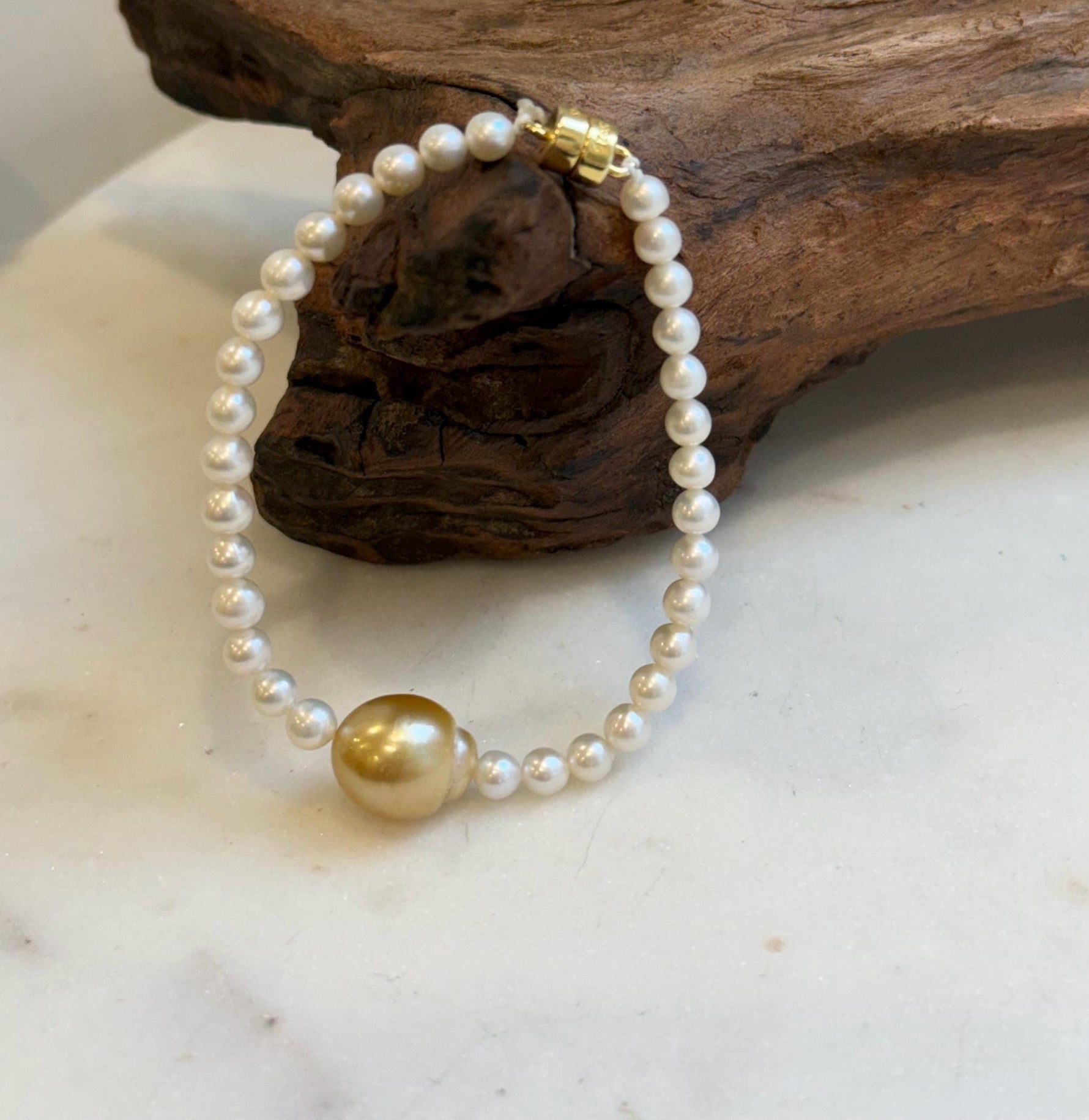 Elly’s 11.7mm South sea deep golden Freshwater Pearls Bracelet: Extreme luster mirrored, S925 silver Bracelet. Different size.