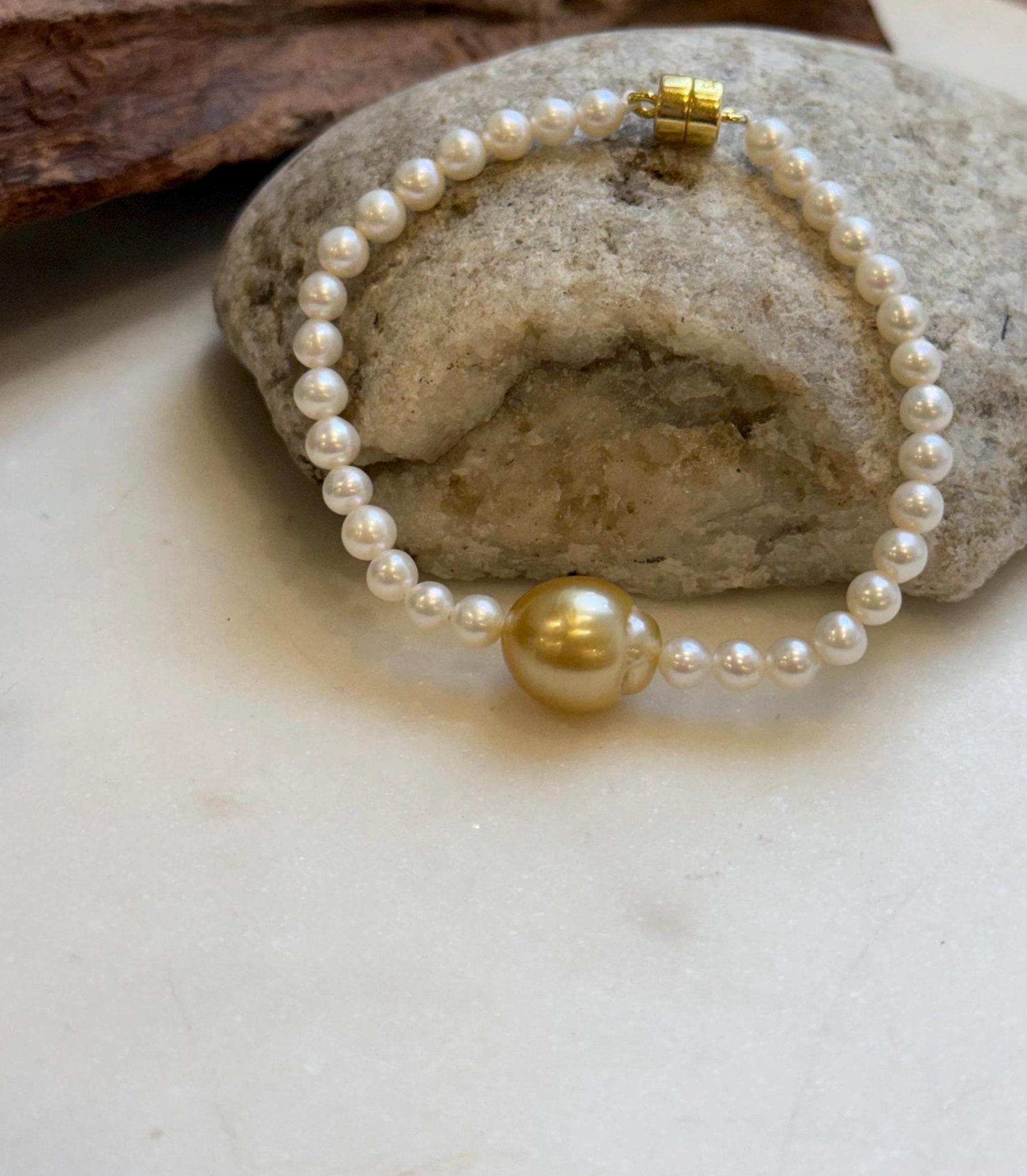 Elly’s 11.7mm South sea deep golden Freshwater Pearls Bracelet: Extreme luster mirrored, S925 silver Bracelet. Different size.