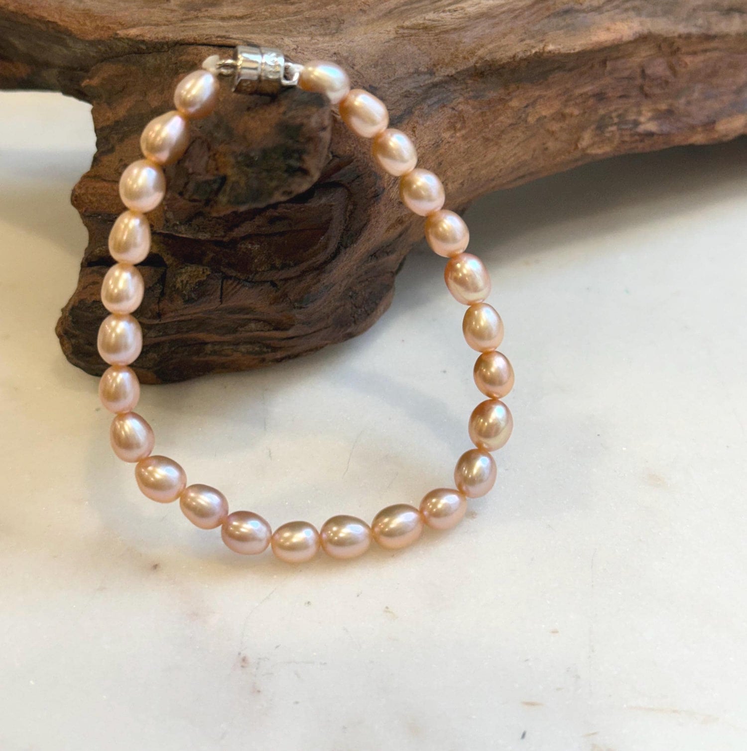 Elly’s Bracelet Peach rose Pearls: Extreme luster mirrored, 5.5-6mm, S925 silver magnetic clips Bracelet, different sizes.