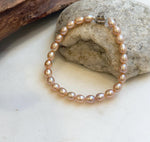 Elly’s Bracelet Peach rose Pearls: Extreme luster mirrored, 5.5-6mm, S925 silver magnetic clips Bracelet, different sizes.