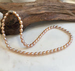 Elly’s Multicolor freshwater pearls necklace:  Extreme luster, peach rose lavender, 5.6-6.4mm, 17.5”, s925 silver necklace strand.