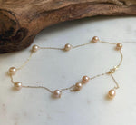 Elly’s 10pcs 7-7.8mm Freshwater peach pearls Satellite Necklace: Extreme luster mirrored, S925 silver satellite necklace, to 18.1”.