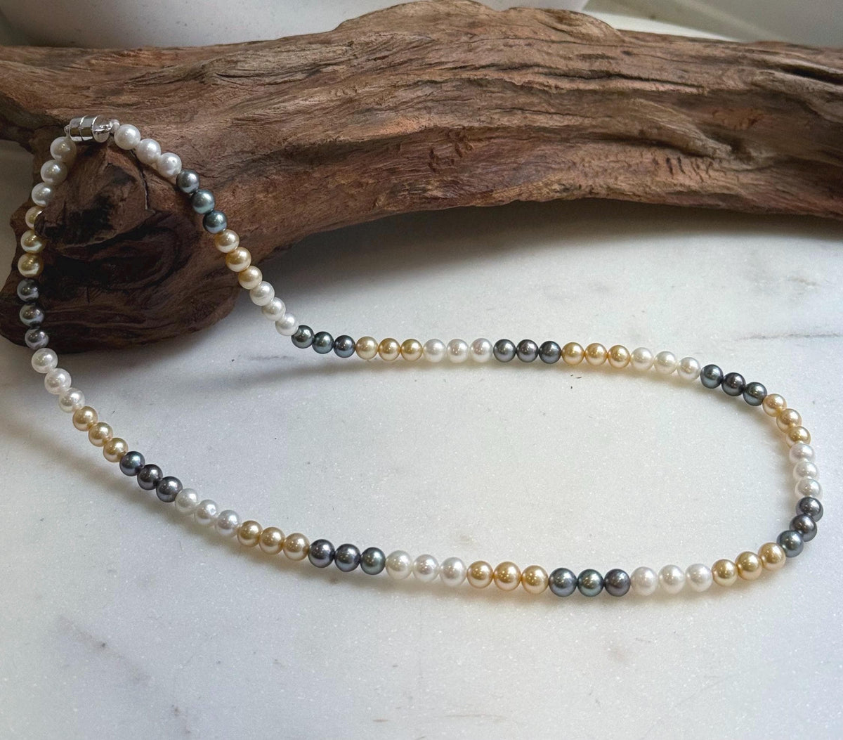 Elly’s 5.2-5.6mm  Freshwater White golden peacock pearls necklace: Extreme luster mirrored, 17.5”, s925 silver necklace strand.