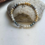 Elly’s 5.2-5.5mm  Freshwater White golden peacock pearls bracelet: Extreme luster mirrored, s925 silver bracelet, different sizes.