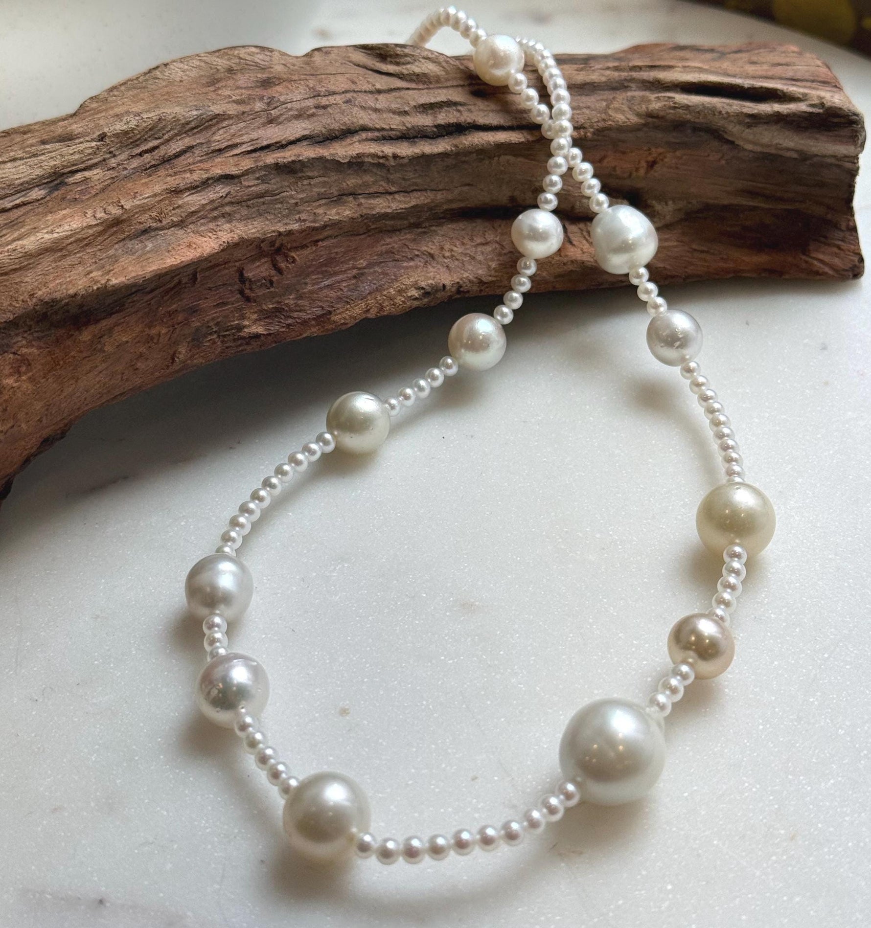 Elly’s 12pcs 9.2-14.4mm Australian ocean white Freshwater pearls necklace:Extreme luster mirrored, 20”, S925 silver necklace strand.