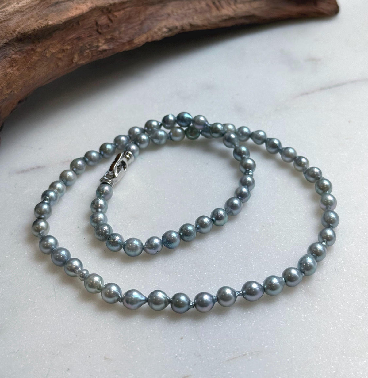 Elly’s 5.6-6mm Akoya Silver Blue ocean pearls necklace:Extreme luster mirrored, 17.6”, S925 silver necklace strand.