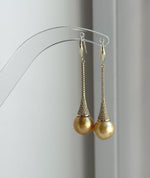 Elly’s 11mm Genius South sea deep golden ocean Pearls Earrings hooks: Extreme luster mirrored, 5.1cm high, S925 silver earrings.
