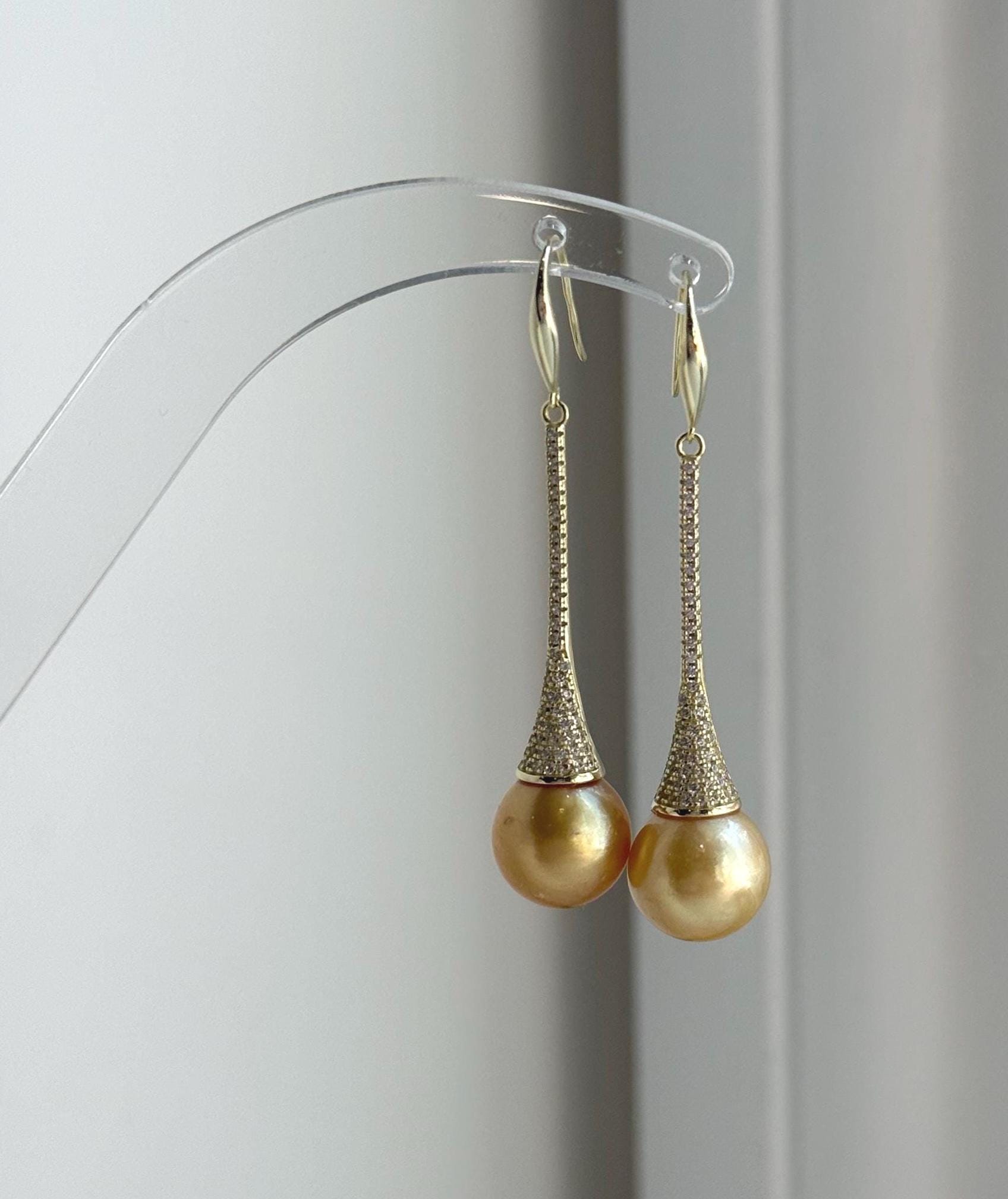 Elly’s 11mm Genius South sea deep golden ocean Pearls Earrings hooks: Extreme luster mirrored, 5.1cm high, S925 silver earrings.
