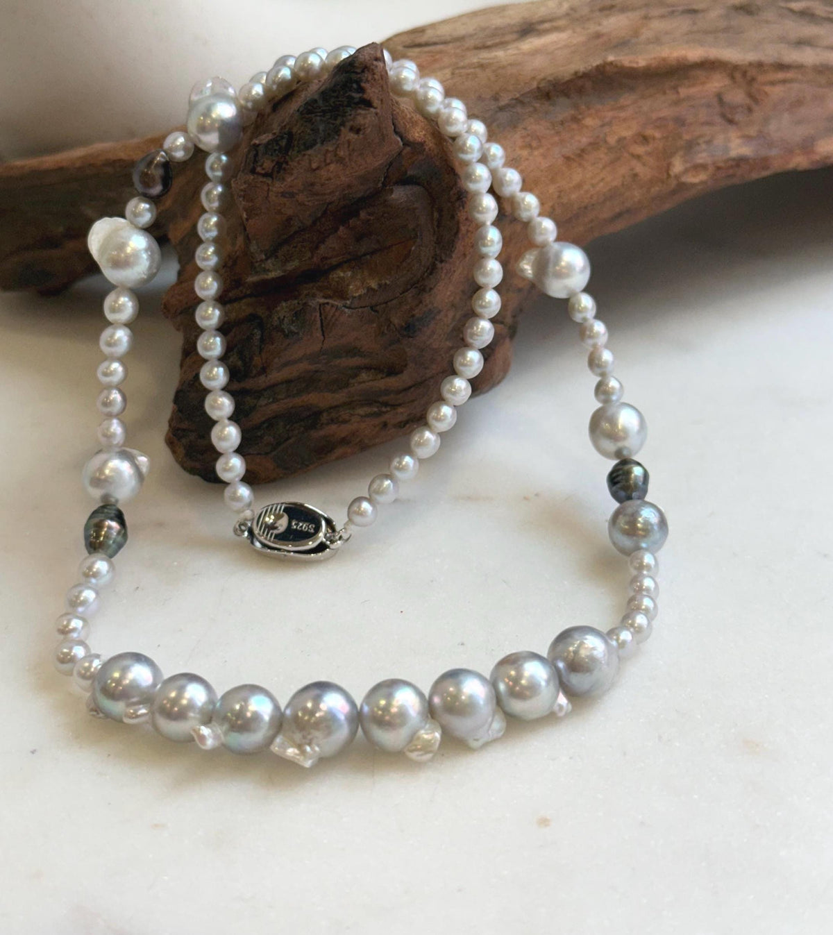 Elly’s Akoya tail baroque ocean white Freshwater pearls necklace:Extreme luster mirrored, 18.2”, S925 silver necklace strand.