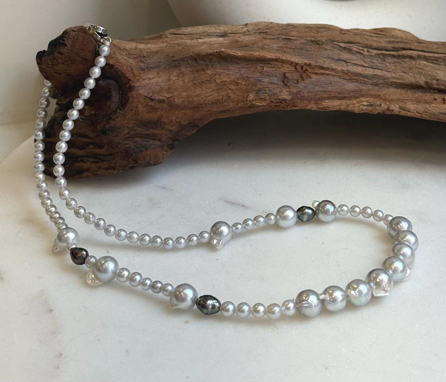 Elly’s Akoya tail baroque ocean white Freshwater pearls necklace:Extreme luster mirrored, 18.2”, S925 silver necklace strand.