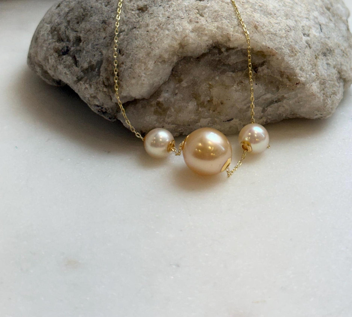 Elly’s Tri Au750 18k Gold South sea golden Akoya ocean Pearls Floating pendants:Extreme luster, 7.7-11.7mm.