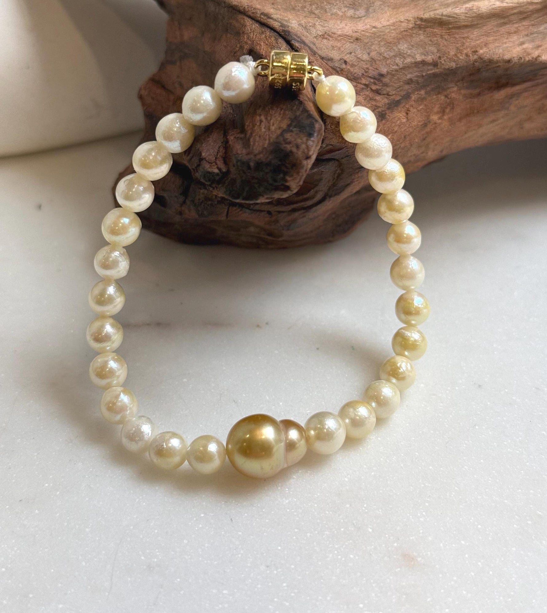 Elly’s 10.7mm South sea Gourd deep golden Akoya ocean Pearls Bracelet: Extreme luster mirrored, S925 silver Bracelet. Different size.