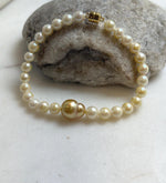 Elly’s 10.7mm South sea Gourd deep golden Akoya ocean Pearls Bracelet: Extreme luster mirrored, S925 silver Bracelet. Different size.